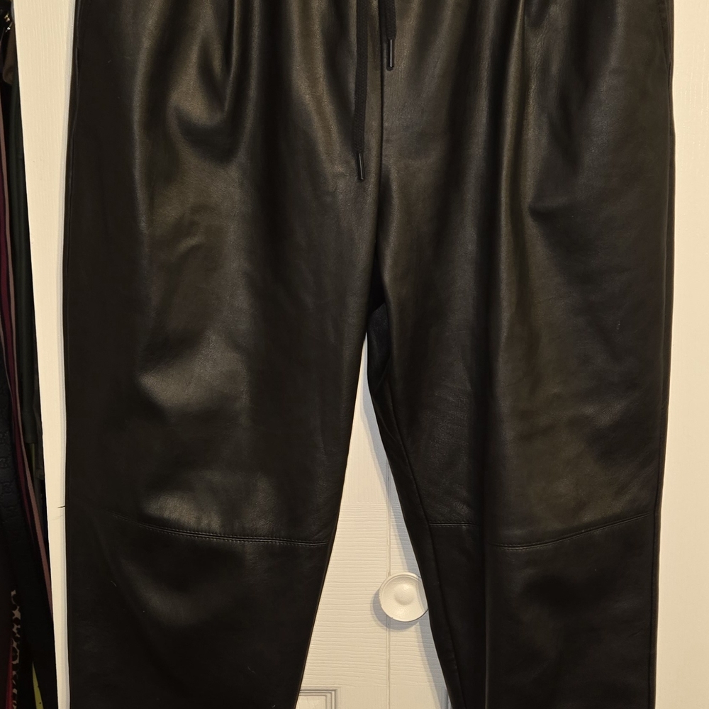 Zara Black Joggers with Smooth Texture and Form-Fitting Design